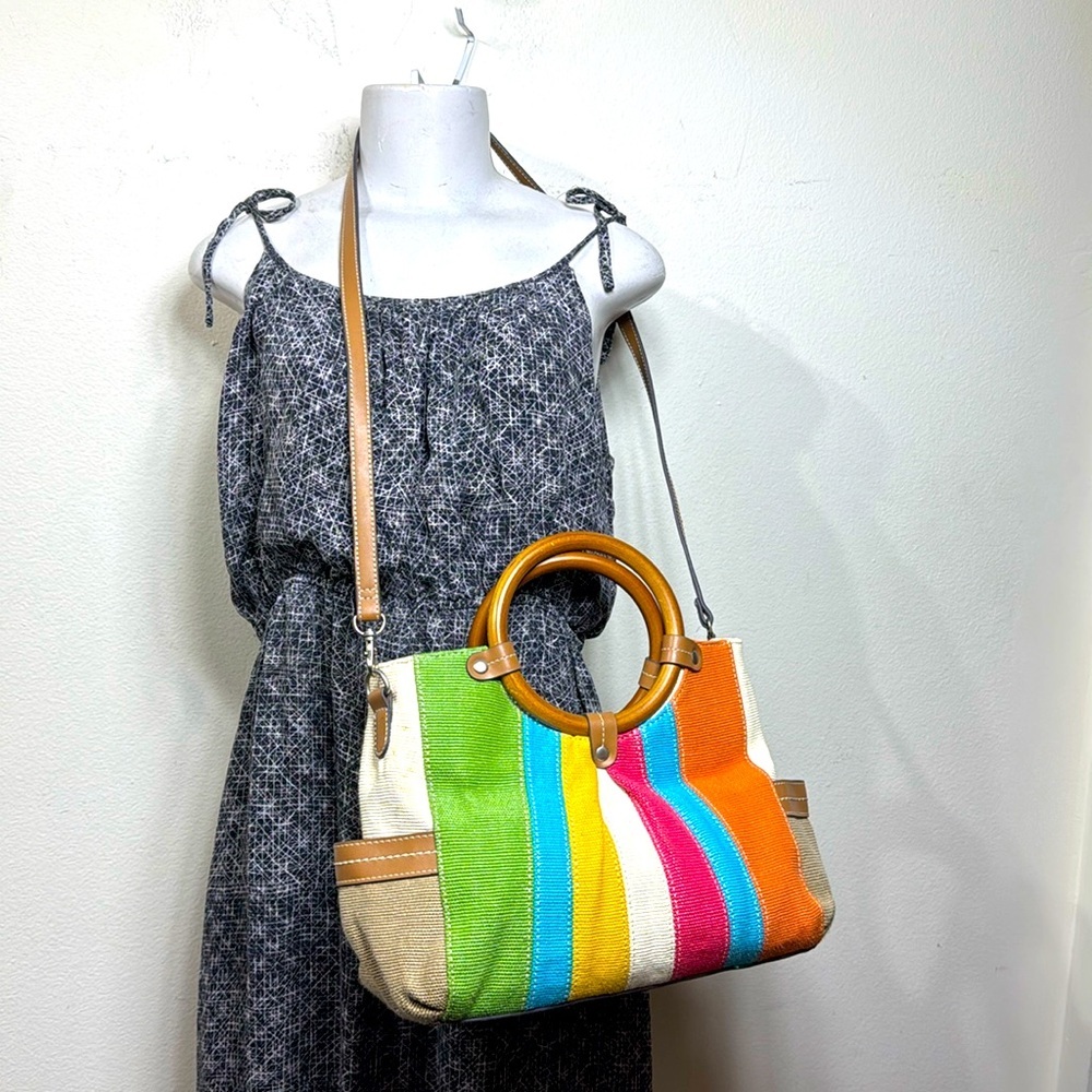 Vintage Relic 
Shoulder bag
Striped wooden handle with strap